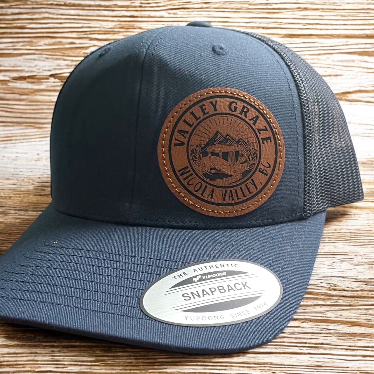 valley graze blue hat with brown patch